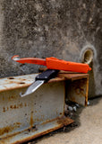 Combat Troodon Frag HS Rescue Cerakote Orange Fully Serrated (601-3CORHS)